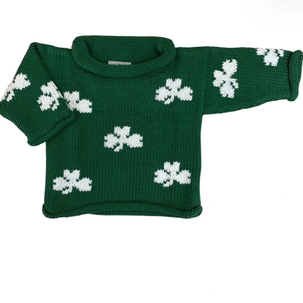 the RED WAGON Green All Over White Shamrocks Roll Neck Sweater Unisex